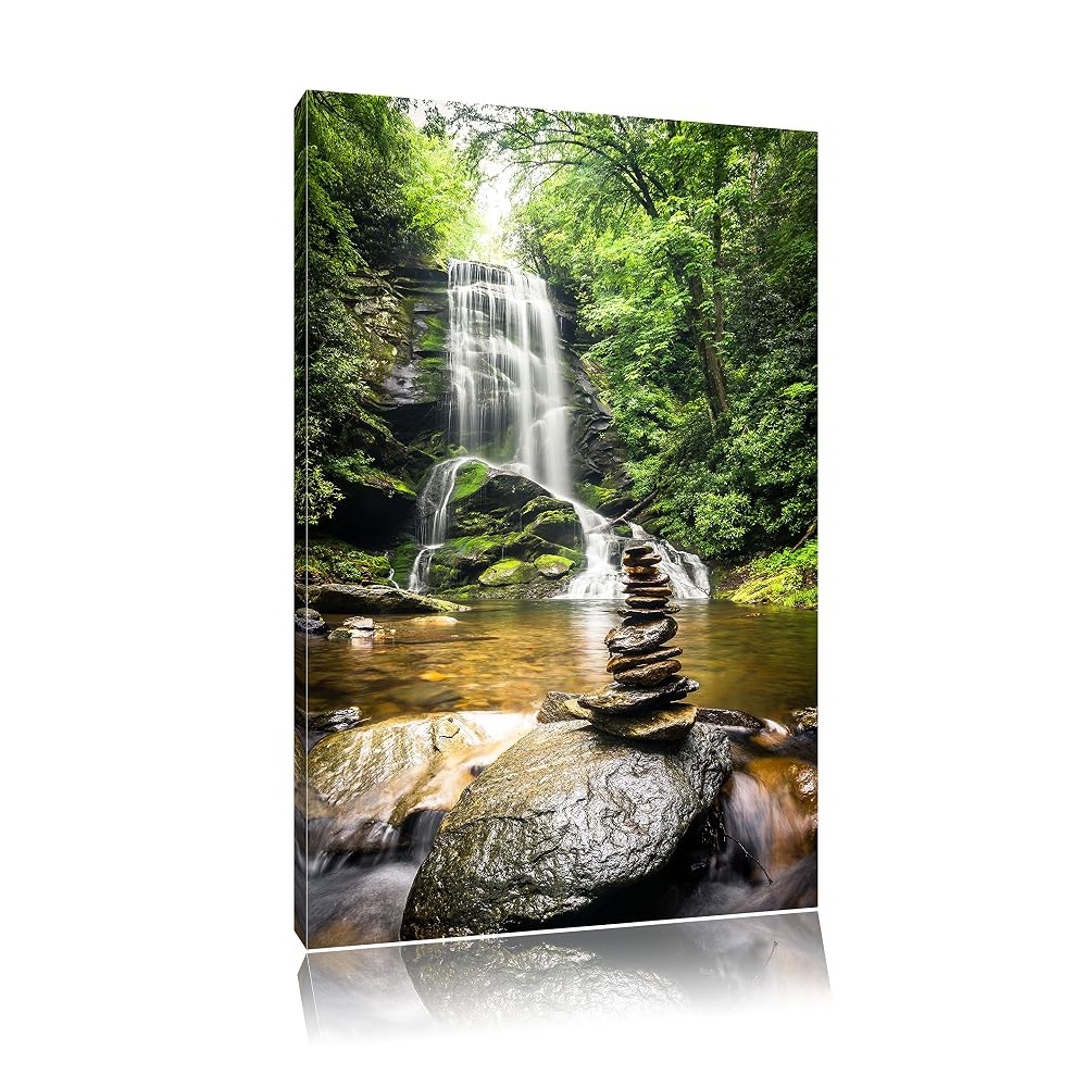 Tableau pierres zen devant une cascade